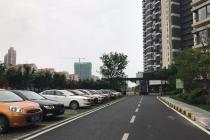 不能办理产权登记为专有部分，小区停车位属于全体业主共有